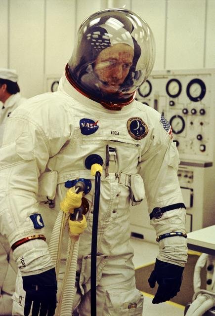 Astronaut Edwin Aldrin walks on lunar surface near leg of Lunar Module