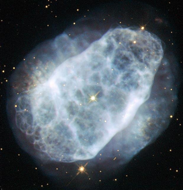 Hubble Unveils Colorful and Turbulent Star-Birth Region on 100,000th Orbit Milestone