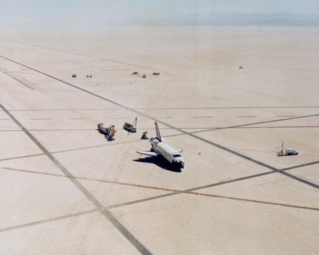 The Space Shuttle Columbia on Rogers Dry lakebed at Edwards AFB after landing to complete its first orbital mission on April 14, 1981