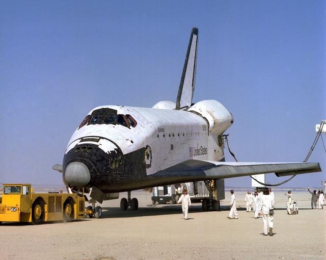 The Space Shuttle Columbia on Rogers Dry lakebed at Edwards AFB after landing to complete its first orbital mission on April 14, 1981