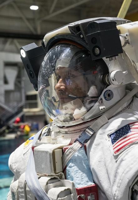 NASA astronaut Anil Menon participates in a spacewalk training session at Johnson Space Center